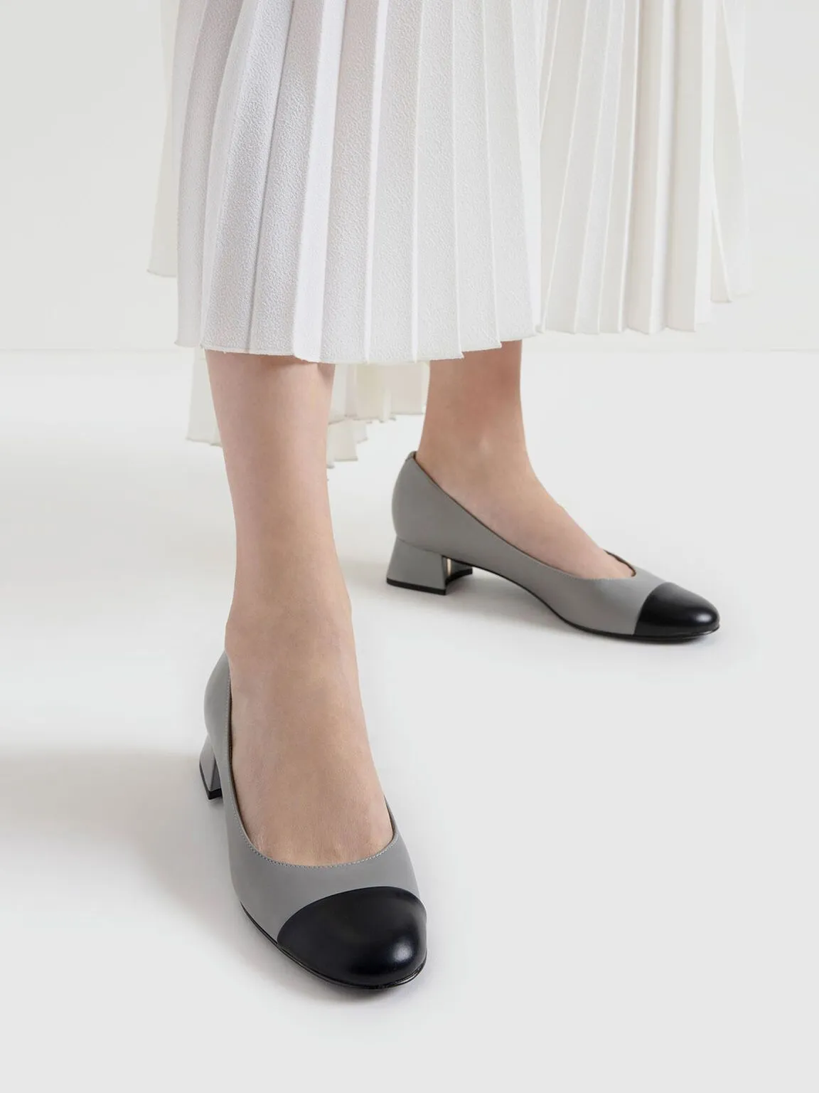 Two-Tone Round Toe Curved Block Heel Pumps